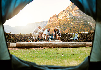 Image showing People camping with a tent and roast marshmallows on a campfire enjoy outdoors, nature and the wild. Fresh air, adventure and travel lifestyle campers on a campsite relax and bond on wellness retreat