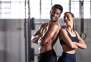 Image showing Team, gym and fitness couple doing exercise workout and living a healthy, wellness and athletic lifestyle together. Happy, energy and strong friends using teamwork for fun motivation in training