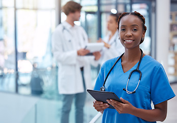 Image showing Nurse, professional and healthcare worker with tablet in medical center, clinic and hospital while analyzing test result. Portrait of frontline worker showing trust, care and knowledge about medicine