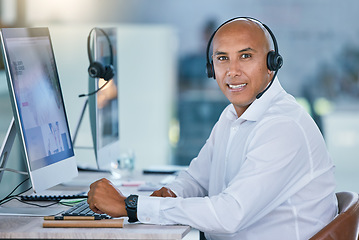 Image showing Call center agent, sales man and customer service support operator giving friendly, help and good advice while working on computer. Portrait of smiling hotline consultant, helpdesk and contact us