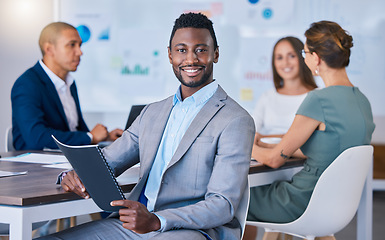 Image showing Portrait of a confident business man leading a meeting in a modern office, smiling and empowered. Happy black male discussing innovative strategies, marketing, planning and creative startup strategy