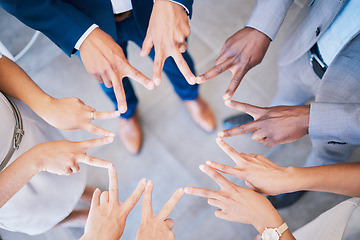 Image showing Group of colleagues peace sign hands together for victory, success and unity or teamwork, collaboration and bonding. Diverse team show support, global synergy and community, united for common goal.