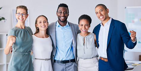 Image showing Multicultural, smiling and celebrating success, a startup group in a modern office. Attractive, diverse, young and happy team in the workplace, ready to work and support future financial projects.