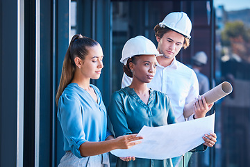 Image showing Engineer, architect or designer team looking at blueprint, design layout paper for construction building outside. Diverse city planner or business people with architecture development or floor plan