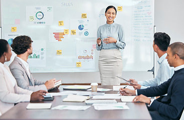 Image showing Presentation, workshop and training seminar with a young business woman talking to her team of colleagues during a boardroom meeting. Learning, teaching and coaching during an upskilling session