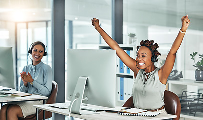 Image showing Call centre, cheerful and agent celebrating with arms up at her office desk. Successful, professional and positive customer review or bonus. Helpdesk worker excited with salary performance increase.