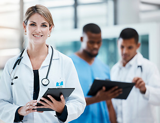 Image showing Science, innovation and health care with leading doctors working on digital tablet, planning together. Diverse healthcare professionals discussing medicine, treatment researching a cure for cancer