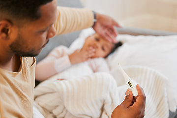 Image showing Sick, cold and flu of sick child with caring and loving parent taking temperature of his daughter. Father on family responsibility leave to care, love and treat his little girl with fever at home.