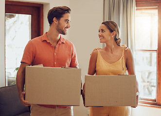 Image showing Moving, home and couple holding boxes while looking happy with their choice. Relationship, growth and investing for new future. Purchase, investment and house loan approved for people in love.
