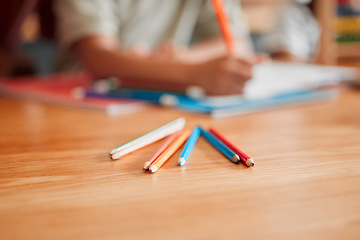 Image showing Pencils, crayons and pens on a table for creative drawing, artwork and art education in a classroom at school. Coloring supplies, equipment and tools for creativity, artist students on a desk