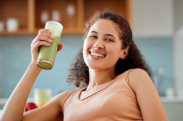 Image showing Green smoothie, drink and healthy juice for weight loss, detox or breakfast diet in home living room. Portrait of smiling, happy woman drinking fruit or vegetarian beverage with vitamins or nutrition