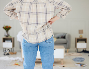 Image showing Spring cleaning, messy, dirty room with woman feeling annoyed, frustrated and tired. Tidying and arranging untidy living room, lounge and home space for personal hygiene or after a break in or theft