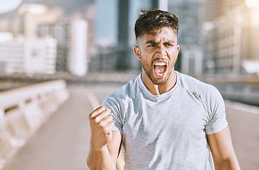 Image showing Exercise motivation, celebration and training of a man runner after running in a city. Excited, motivated and workout mindset of a sport, fitness and athletic athlete happy about sports success