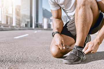 Image showing Runner getting ready for fitness running in city street, cardio training workout in town and preparing for exercise in road downtown. Active male jogging, exercising and doing physical activity