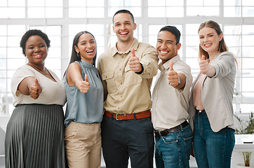 Image showing Thumbs up, motivation and support from a team of design, architecture or marketing professionals. Business employees, staff or colleagues standing together in collaboration, solidarity and unity