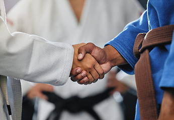 Image showing . Handshake, respect and discipline with mma, karate and fight students shaking hands before a match or combat sport in a training gym or dojo. Training, exercise and workout in self defense class.