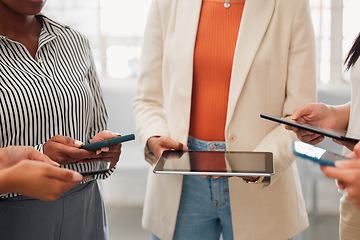 Image showing Working on tablet in meeting, holding phone and networking with colleagues in an office at work. Closeup of hands of business people checking emails, planning online and browsing the internet