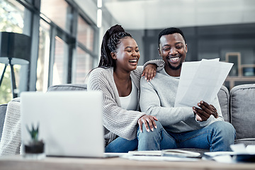 Image showing Happy, smiling and carefree black couple checking their finances on a laptop at home. Cheerful husband and wife excited about their financial freedom, savings, investment and future planning