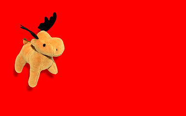 Image showing Christmas Deer over red background