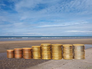 Image showing Money on the beach