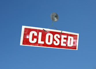 Image showing Red closed sign over blue sky
