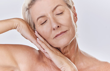 Image showing Skincare, beauty and wellness with health, skin and face of a senior woman in a studio on a purple background. Relax, spa and skin care with an elderly, calm model feeling healthy, happy and natural