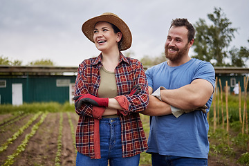 Image showing Sustainability, agriculture and farmer couple on a farm growing vegetable crops, enjoying a clean eco friendly environment. Happy rustic people, man and woman with vision for sustainable development