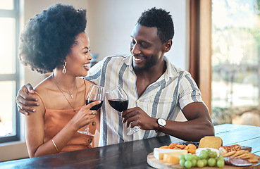 Image showing Young couple celebrating with wine and cheers at resort, laugh and bonding on romantic date. Carefree, in love black girlfriend and boyfriend toasting, enjoying relationship, alcohol and conversation