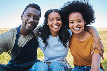 Image showing Diversity, black afro friends hugging, bonding and smile together outside. Happy group of people enjoying vacation and having fun during summer with friendship on their holiday and nature travel