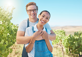 Image showing In love, countryside and farmer couple enjoying grape vine plant growth development in summer with flare or sunlight and blue sky. Happy, young rustic people hugging on a sustainable farm or vineyard