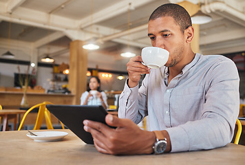 Image showing Restaurant, cafe business or bakery customer drinking coffee or tea on break, streaming or scrolling on social media. Relaxing consumer working freelance or doing online shopping on tablet
