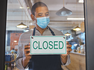 Image showing Covid financial crisis, business closure and lockdown due to recession, startup failure and bankruptcy. Broke cafe worker with closed sign on window for poor economy, store shutdown and pandemic