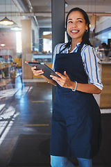 Image showing Startup, management and cafe owner online order on digital tablet doing inventory, happy and checking stock. Smiling woman enjoying her job, looking proud and ambitious at a new small business