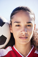 Image showing Serious, female and young soccer athlete with a football ready for a workout, match or exercise. Portrait of a teen student girl face in a sport uniform before fitness and school sports training