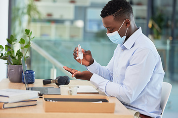 Image showing Hygiene, compliance and covid rules at work with a business man sanitize hands before a shift. Professional male worker cleaning hand before going online with marketing project or design