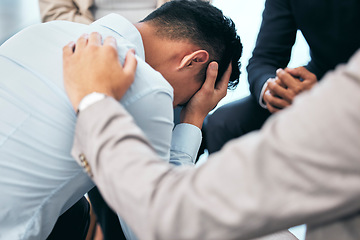 Image showing Support and empathy for suffering from mental health, .anxiety and depression businessman in group therapy. Love, care and trust from friends or coworkers for sad man in stress and pain from bad news