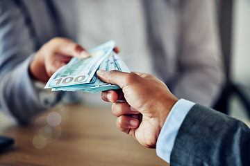 Image showing Hands of a businessman, paying money for a service, contract or purchase agreement. Closeup of depositing notes into a bank for investment. Cash, corruption and a financial bribe