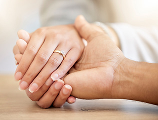 Image showing .Couple engagement with hands holding and presenting a diamond ring for a save the date announcement. Love, hope and trust between a man and woman with jewelry ready for a future wedding celebration.