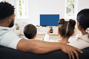 Image showing Blue screen, chroma key tv with a relax family watching and enjoy streaming movies, series and entertainment copy space. Back view of parents and kids spending leisure time viewing television