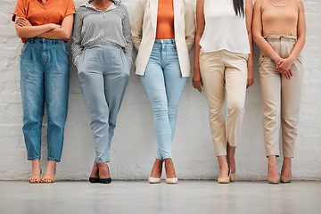 Image showing Trendy, fashionable and stylish women standing in a row for a design, marketing or stylist job interview. Casual, elegant and cool young professional females organized, ready and waiting in line