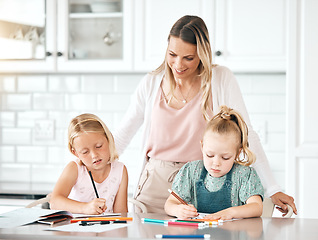 Image showing Education, learning and homework with a girl, her sister and their mom in the kitchen at home. Single mother helping, assisting and teaching her daughter with school, studying and coloring or drawing