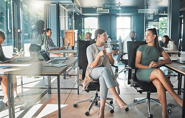 Image showing Diversity, businesswomen and open plan office with a group of executive, corporate colleagues and coworkers. Talking team sharing ideas and innovation strategy in a modern workplace for collaboration