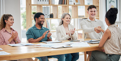 Image showing Interview, hiring and business of a creative team in a welcome meeting handshake and thank you for job. Diversity, teamwork and corporate group celebration in recruitment or success of new employee.