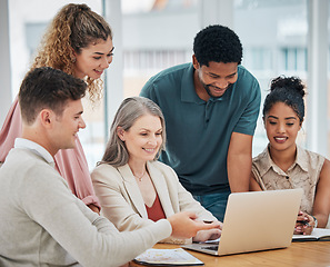 Image showing Teamwork, togetherness and unity with a team of colleagues and female leader, boss or manager working on a laptop during a boardroom meeting in the office. Planning, discussing and talking strategy