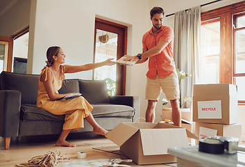 Image showing Couple recycle, donate and packing boxes for relocation while moving house for sustainability and eco friendly lifestyle. Saving environment with zero waste for a green, clean and happy future