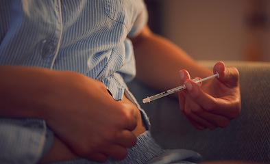 Image showing Diabetes, diabetic and insulin injection of a woman with a chronic disease late at night. Hands of a female taking her daily shot of treatment with a syringe in the evening at home
