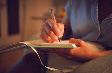 Image showing Creative writing at home by female hands enjoying a calm, peaceful day off indoors. Woman making notes in a journal, expressing her feelings and thoughts while making a note of a personal experience