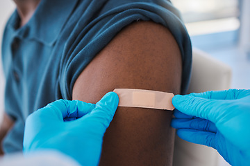 Image showing Covid vaccine, first aid or health and wellness with medical doctor consulting patient in hospital room. Trust, safety or pharma nurse or healthcare professional working with man for medicine