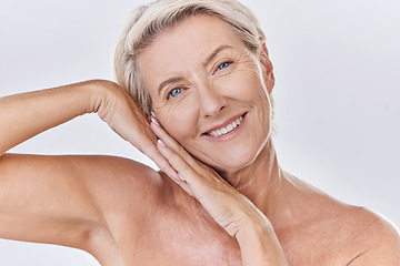Image showing Skincare, clean and happy senior woman face resting on hands in a studio portrait. Elderly beauty skin care model posing or showing bedtime routine for perfect, healthy looking or wrinkle free aging