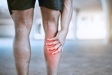 Image showing Sports man hand on a leg injury while training, exercise or workout. Red graphic to identify muscle ache or pain in the body after running accident outdoor. Athlete hurt after cardio fitness routine